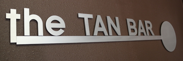 Business logo for The Tan Bar